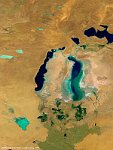 Aral Sea, Kazakhstan  The 100 m false-colour image of 25 October 2015 shows us the Aral Sea, an endorheic lake lying between Kazakhstan (Aktobe and Kyzylorda Regions) in the south and Uzbekistan (Karakalpakstan autonomous region) in the north. Formerly one of the four largest lakes in the world with an area of 68,000 km², the Aral Sea has been steadily shrinking since the 1960s. By 2007, it had declined to 10% of its original size, splitting into four lakes – the North Aral Sea, the eastern and western basins of the once far larger South Aral Sea, and one smaller lake between the North and South Aral Seas. By 2009, the southeastern lake had disappeared and the southwestern lake had retreated to a thin strip at the western edge of the former southern sea; in subsequent years, occasional water flows have led to the southeastern lake sometimes being replenished to a small degree. In an ongoing effort in Kazakhstan to save and replenish the North Aral Sea, a dam project was completed in 2005; in 2008, the water level in this lake had risen by 12 m compared to 2003. Salinity has dropped, and fish are again found in sufficient numbers for some fishing to be viable.   Date: 25/10/2015   Resolution: 300m : lake, aral, sea, kazakhstan, uzbekistan