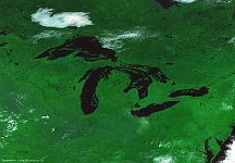 The Great Lakes, USA  The Great Lakes, depicted here on a 300 m image of 26 September 2014, are a series of interconnected freshwater lakes located in northeastern North America at the Canada–United States border. They consist of Lake Superior, Lake Huron, Lake Michigan, Lake Erie, and Lake Ontario and have a total area of  about 244,000 km². The Lakes connect to the Atlantic Ocean through the Saint Lawrence River. They originated from the latest glacial era and were worn off by the land ice that was covering the North-American continent.   Date: 26/09/2014   Resolution: 300m : lakes, America
