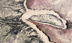 Akimiski Island, Canada  The 100 m false-colour image of 6 January 2017 shows us Akimiski Island, the largest island in St. James Bay, Canada, covered with snow and ice. It has an area of 3,001 km².The island has no year-round human inhabitants; however, it is part of the Attawapiskat First Nation's traditional territory and is frequently used for traditional purposes.  The coastal waters and wetlands of Akimiski Island (and St. James Bay in general) are important feeding grounds for many varieties of migratory birds.   Date: 06/10/2017   Resolution: 100m : ice, snow, canada, bay, coast, birds